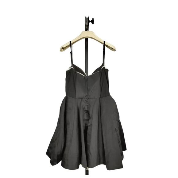 MINIMOISELLE Small
BLACK TULLE MINI DRESS $300
House of CB - Picture 6 of 6